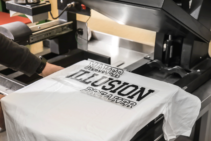 Precision heat transfer vinyl printing application on wholesale clothing