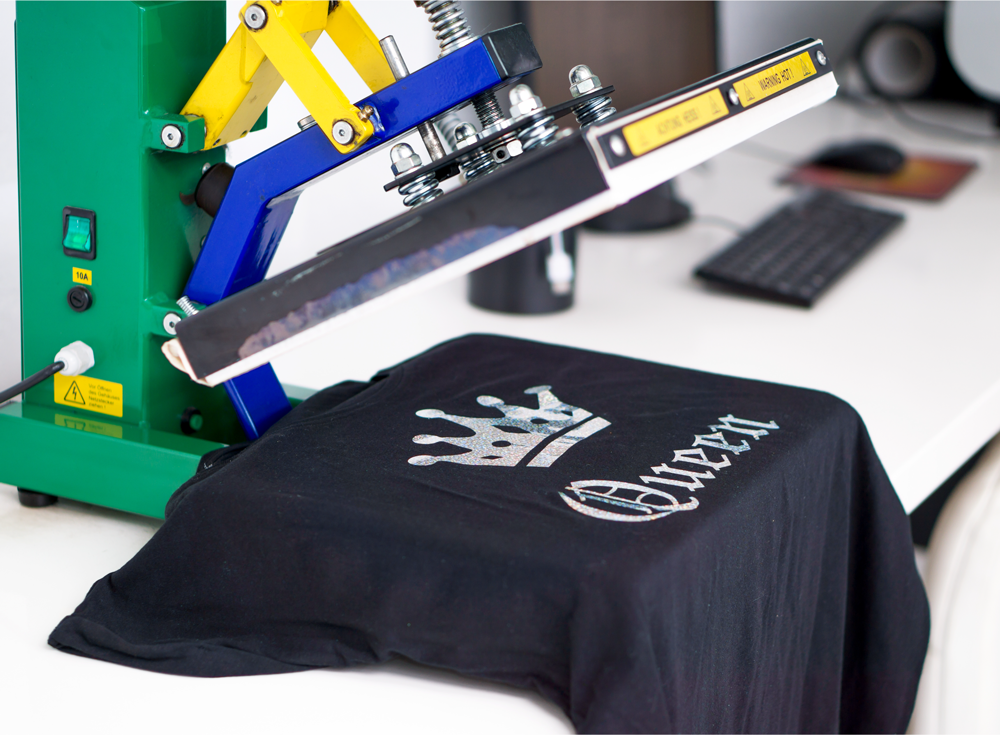 Heat transfer vinyl printing on t-shirts in Los Angeles factory