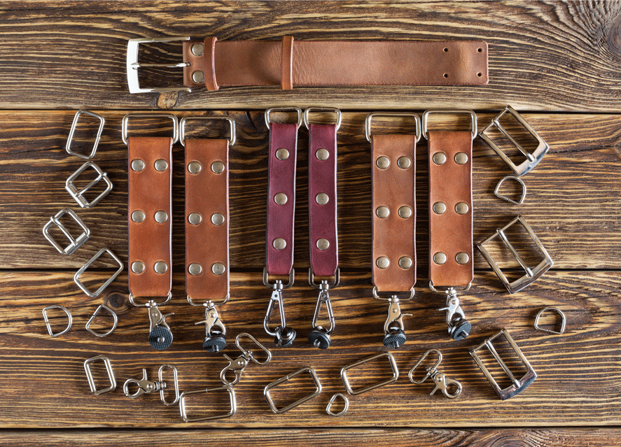Garment buckles grommets and metal slider hardware